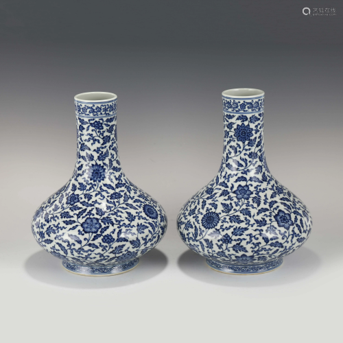 PAIR OF QIANLONG BLUE & WHITE WRAPPED FLORAL VASES