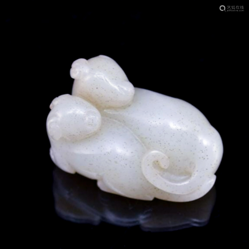 FINE CARVED WHITE JADE OF TWO FERRETS
