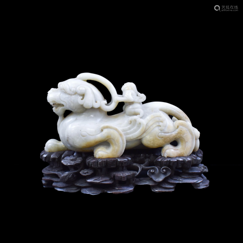 CARVED JADE QILIN SCLUPTURE ON STAND