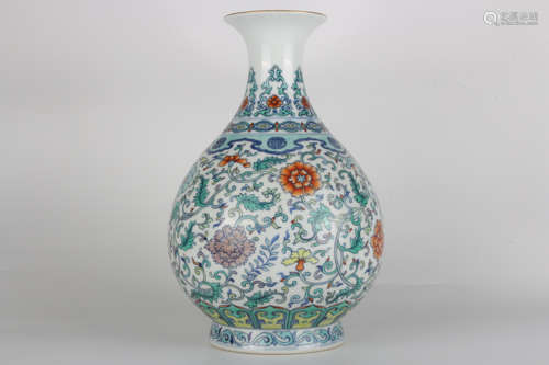 A Qianlong famille-rose jade vase