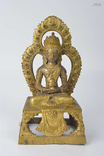 Bronze and gilt backlit Buddha statue