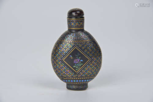 A black lacquer inlaid rodian snuff bottle