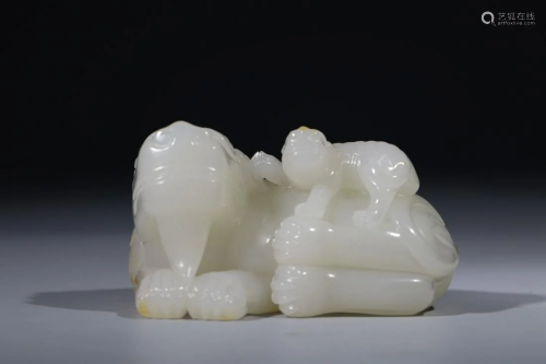 Qing Dynasty - White Jade with Russet Skin 'Lion' Hand