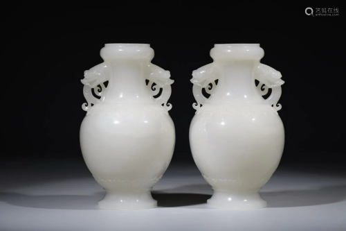 Qing Dynasty - A Pair of White Jade Beast Shaped Handle