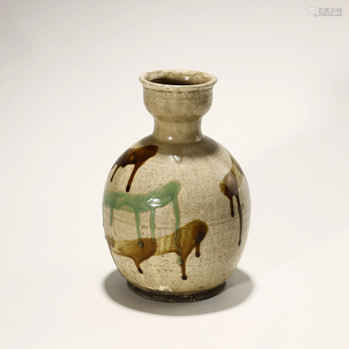 Ancient white porcelain red and green bottle