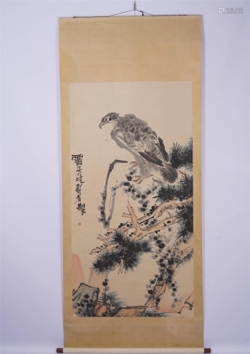A CHINESE PAINTING OF FALCON AND PINE
