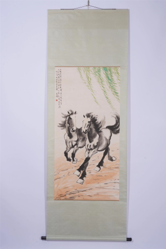 A CHINESE PAINTING OF TWO GALLOPING HORSES