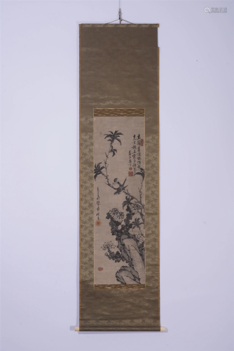 A CHINESE INK PAINTING OF BIRDS ON BLOSSOMS