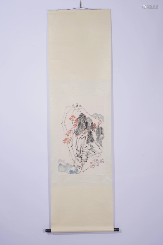 A CHINESE PAINTING OF FIGURES ON MOUNTAIN TOP