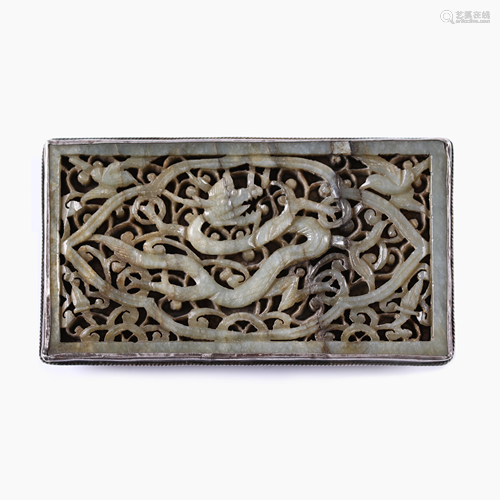 A Chines white jade belt buckle.