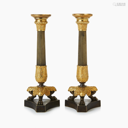 A pair of bronze candles, France, late empire style.