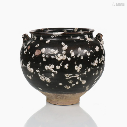 A Chinese black and white glazed porcelain jar