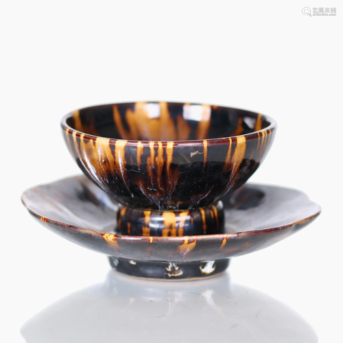 A Chinese 'JIZHOU' ware cup with saucer