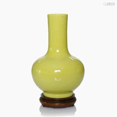 A small Chinese yellow glazed porcelain vase.