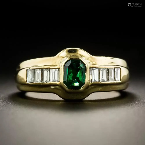 18k yellow gold emerald and diamond ring.