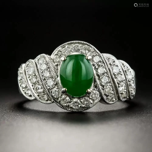 18k white gold jade cabochon and diamond ring.