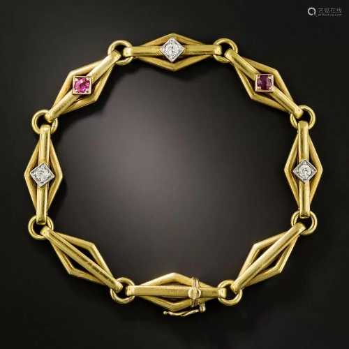 18k yellow gold ruby and diamond bracelet.