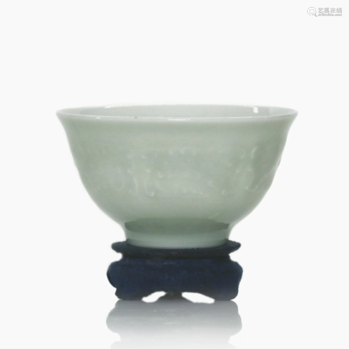 A small Chinese celadon glazed porcelain cup.
