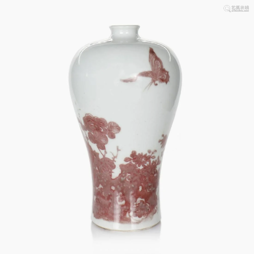 A Chinese red and white glazed porcelain vase.