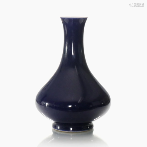 A small Chinese blue glazed porcelain vase.