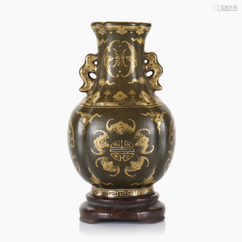 A small Chinese gilt tea dust glazed vase.