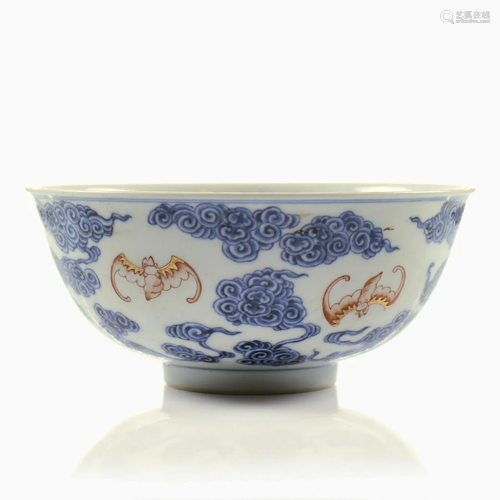 A Chinese blue and white and iron-red glazed bowl.