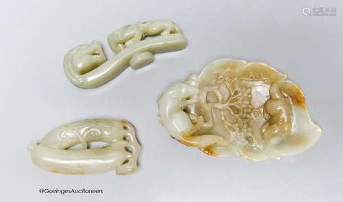 Three Chinese celadon jade carvings, a 'squirrel' brushwashe...