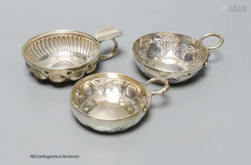 Three 19th century French white metal taste vin, largest 8cm...