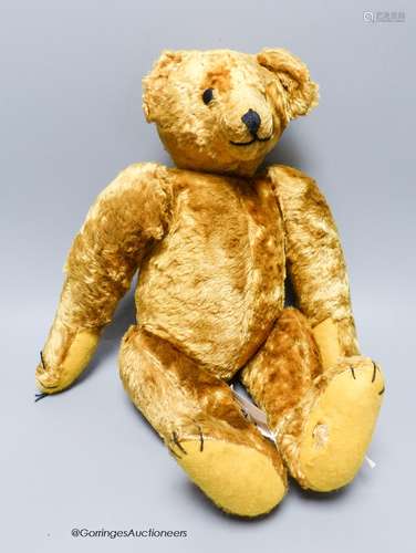 A cotton plush jointed teddy bear, 'Bingo', straw-filled,wit...