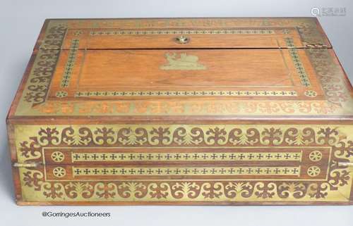 A George IV cut brass and rosewood writing slope, 40cm wide,...