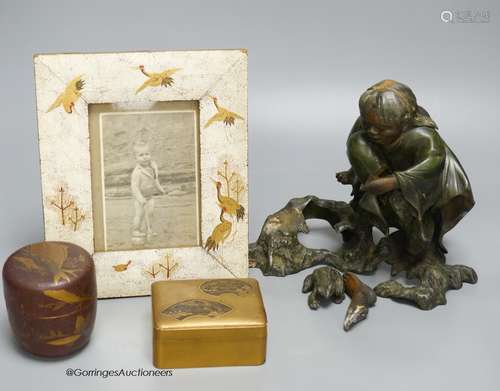 A Japanese lacquer jar and cover, a box and cover, a photo f...