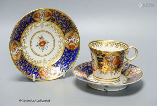 A Chamberlain armorial or crested cup and saucer in the styl...