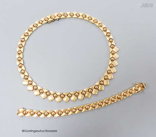 A modern 9ct gold necklace, 44cm and matching bracelet, 18cm...