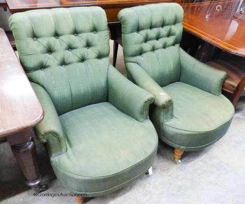 A pair of Victorian style armchairs upholstered in green moi...