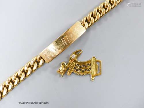 A yellow metal (stamped 750) curb link identity bracelet, 21...