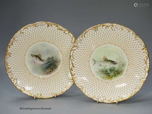 A Wedgwood pair of plates painted with named fish by J.H.Pla...