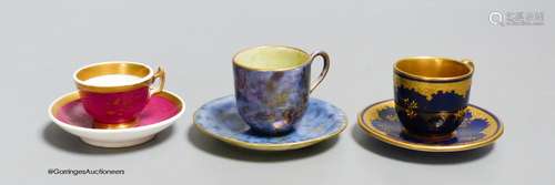 A Wedgwood lustre miniature cup and saucer with gilt decorat...