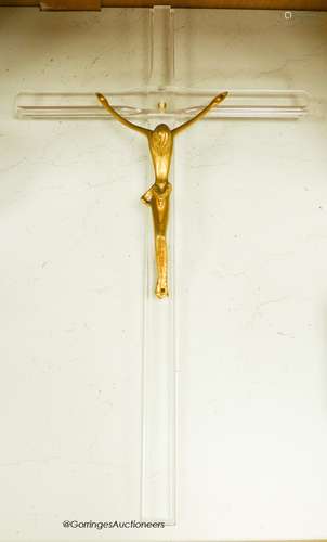 A gilt metal and perspex crucifix formerly attributed to Phi...