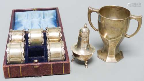 A Mappin & Webb small silver trophy cup, a silver pepperette...