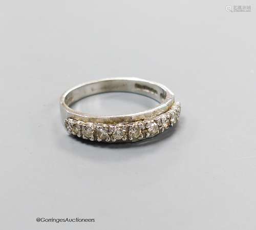 A modern 18ct white gold and eleven stone diamond chip set h...