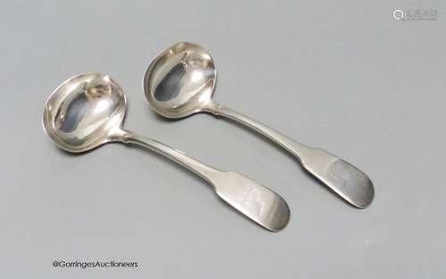 A pair of George IV silver fiddle pattern sauce ladles, by W...