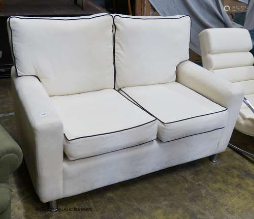 Contemporary faux suede two seater settee. W-140, D-82, H-94...