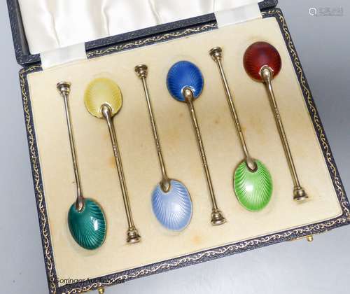 A cased set of six silver gilt and enamel coffee spoons, Bir...