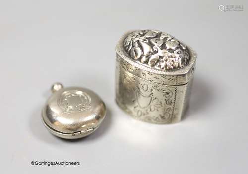 A 19th century Dutch white metal pill box, 42mm and a base m...