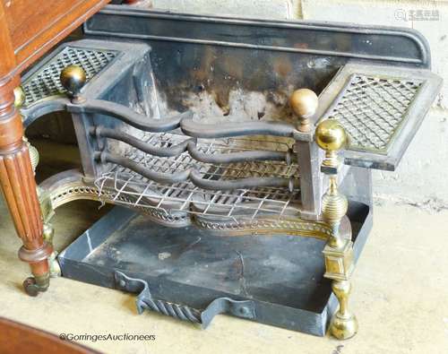 A Victorian iron and brass mounted fire grate. W-83, D-40, H...