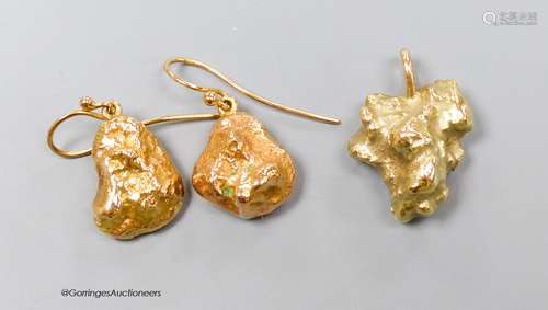 A modern 9ct gold nugget pendant and a pair of similar 9ct e...