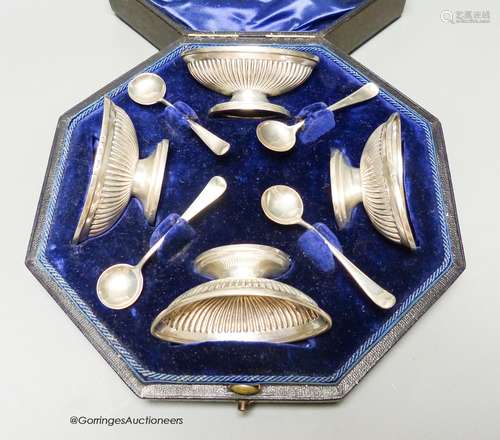 A cased set of four late Victorian fluted oval silver salts ...