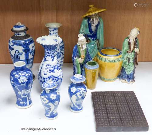 A collection of Chinese vases pottery figures and a compress...