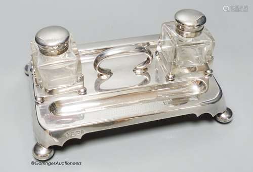 A late Victorian silver inkstand, with handle, pen recesses ...