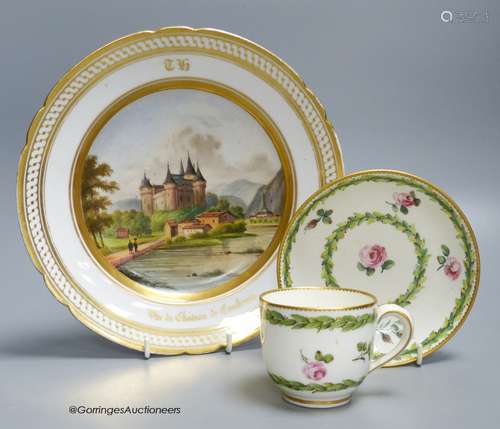 A Sevres porcelain coffee cup and saucer painted with flower...